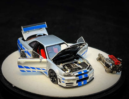 [Pre-Order] PGM x One Model Nissan R34 Z Tune Silver with Blue Stripes,Fully Opening