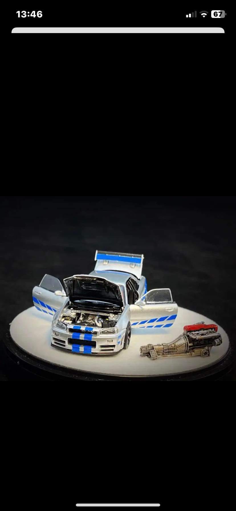 [Pre-Order] PGM x One Model Nissan R34 Z Tune Silver with Blue Stripes,Fully Opening