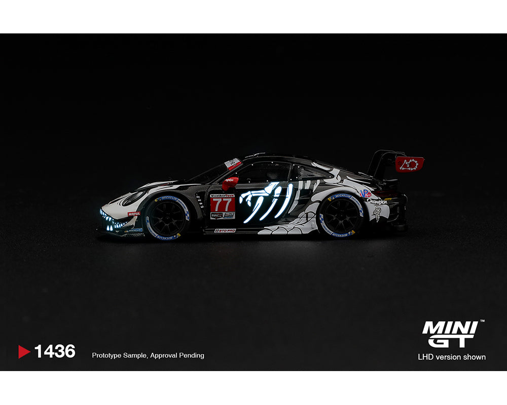 [Pre-Order] Mini GT Porsche 911 GT3 R (992) #77 AO Racing “Skeleton Rexy” 2026 IMSA Petit Le Mans – (Glow in the Dark)